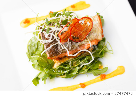 Baked salmon in crab sauce 37477473