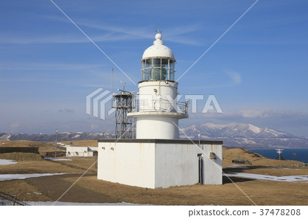 Winter cape lighthouse and blue sky 37478208