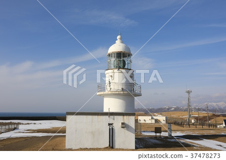Winter cape lighthouse and blue sky 37478273