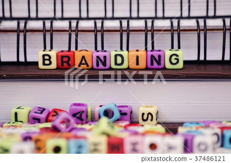 cube dices with word BRANDING on note book cube dices with word BRANDING on note book 37486121