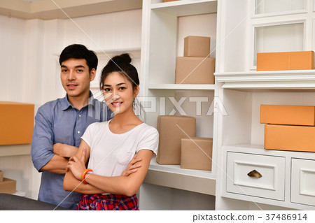 Sme business concept. Young Asian people are packing their packa 37486914