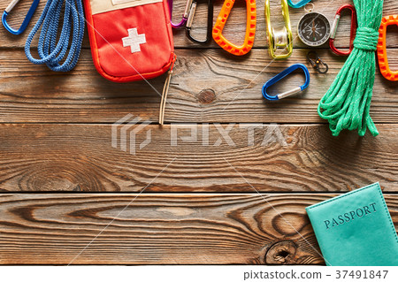 Travel items for hiking over wooden background Travel items for hiking over wooden background 37491847