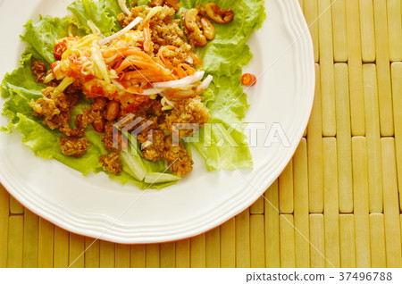 crispy fried chop catfish with green mango salad crispy fried chop catfish with green mango salad 37496788