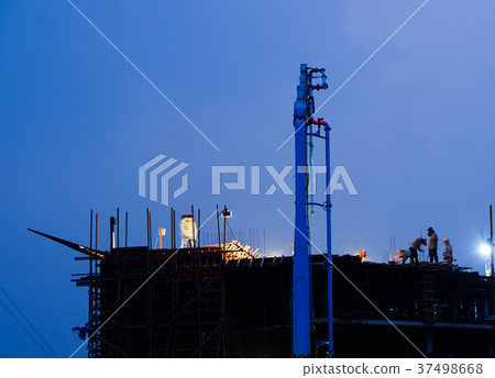 Construction crane truck structure at night Construction crane truck structure at night 37498668