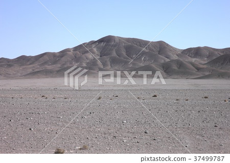 Desolate high desert areas and hills around Calama in northern South America Chile Desolate high desert areas and hills around Calama in northern South America Chile 37499787