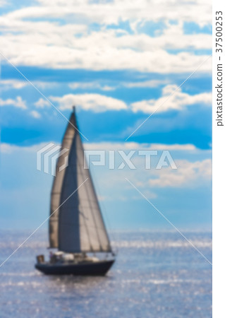 Blue sailboat - blurred image Blue sailboat - blurred image 37500253