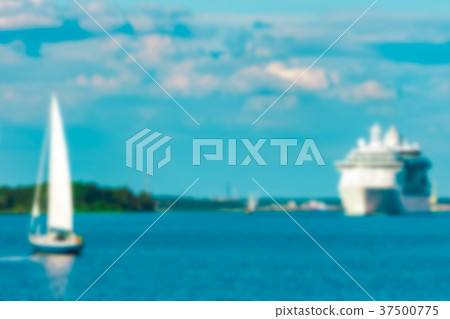 Blue sailboat - blurred image Blue sailboat - blurred image 37500775