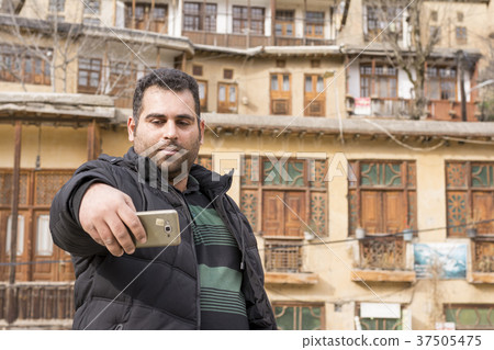 young man taking selfie in Masuleh village ancient 37505475