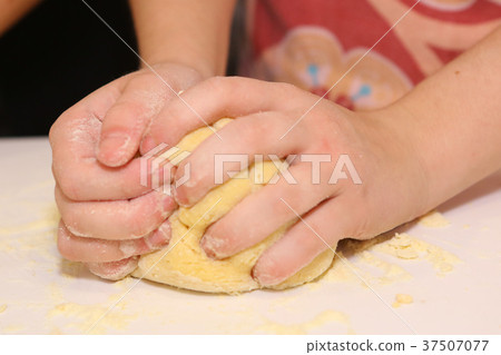 hands with dough cooking  37507077