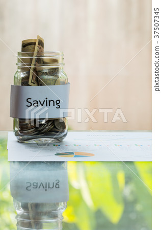 The money in the jar for savings money 37507345