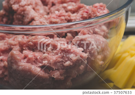 Sliced potato and meat stuffing for meatballs Sliced potato and meat stuffing for meatballs 37507633