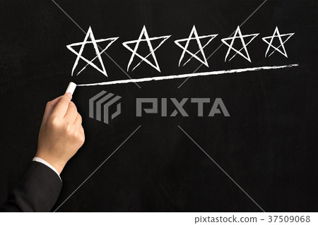 Hand of businessman writing five star on board 37509068