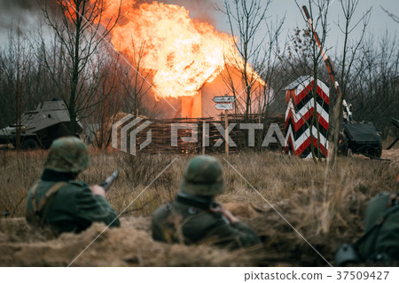 German soldiers in the trench during the battle German soldiers in the trench during the battle 37509427