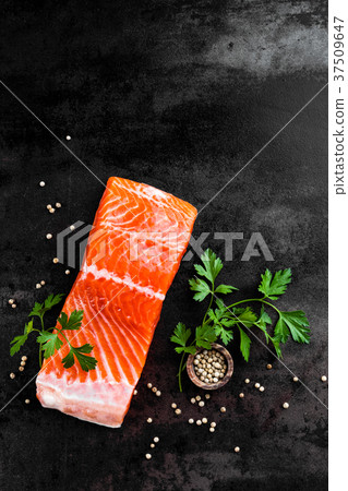 Fresh salmon fish fillet on black background 37509647