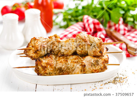 Grilled meat skewers, shish kebab 37509657
