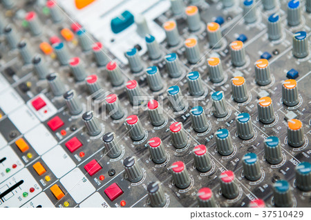 Close-up of music mixer button, setting volume  37510429