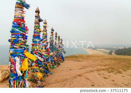 Wooden ritual pillars with colorful ribbons Hadak Wooden ritual pillars with colorful ribbons Hadak 37511175