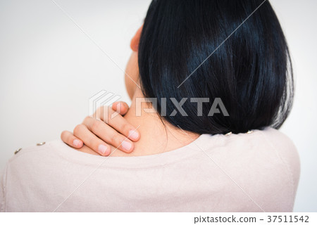 Woman massaging her neck and painful Woman massaging her neck and painful 37511542