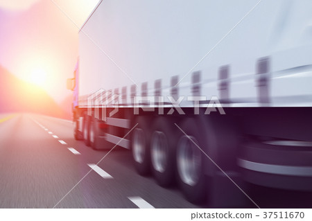 Semi-truck on a highway in sunset 37511670