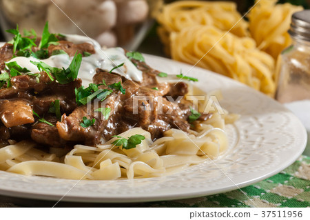 Homemade beef Stroganoff with pasta Homemade beef Stroganoff with pasta 37511956
