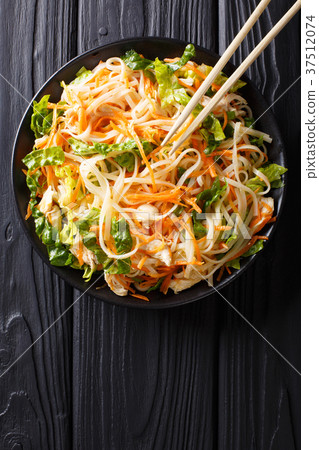 Vietnamese chicken salad with rice noodles, carrot Vietnamese chicken salad with rice noodles, carrot 37512074