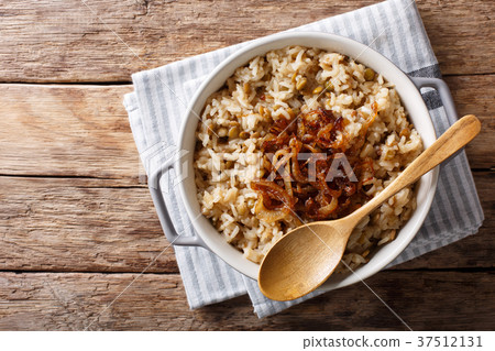 Stewed rice with lentils and fried onions 37512131