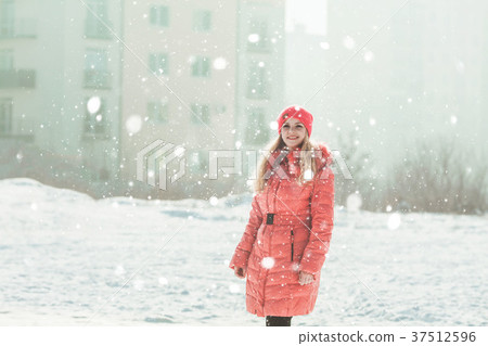 Girl in red parka Girl in red parka 37512596