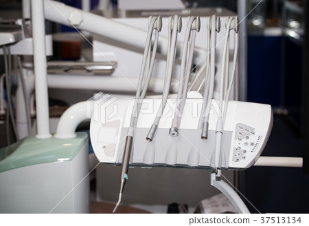 Dental instruments and equipment closeup. Dental instruments and equipment closeup. 37513134