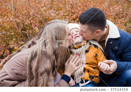 family to boys walk on autumn Woods family to boys walk on autumn Woods 37514359