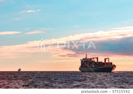 Blue container ship underway 37515542