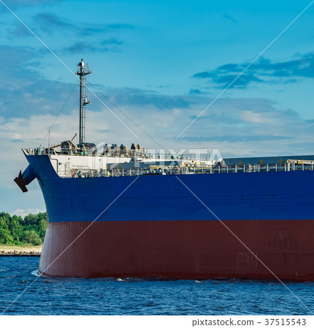 Blue cargo ship underway 37515543