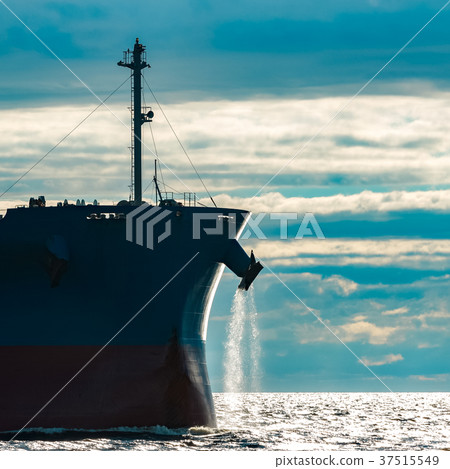 Blue cargo ship underway Blue cargo ship underway 37515549
