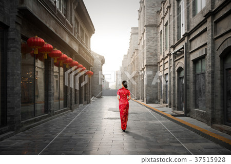 Asian young woman in Hutong, Beijing, China. Asian young woman in Hutong, Beijing, China. 37515928