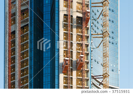 Passenger hoist lift in construction site Passenger hoist lift in construction site 37515931