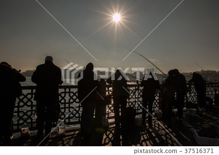 Sunset in Galata Bridge Istanbul 37516371