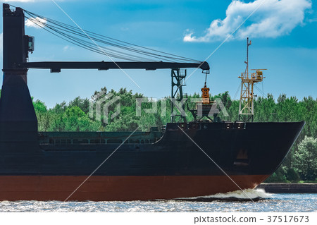 Blue cargo ship underway Blue cargo ship underway 37517673