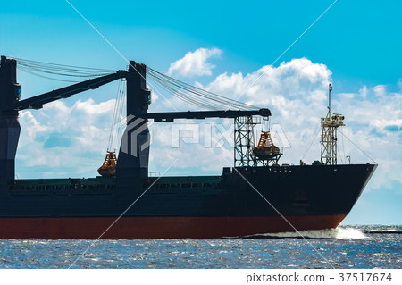 Blue cargo ship underway Blue cargo ship underway 37517674