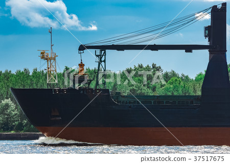 Blue cargo ship underway Blue cargo ship underway 37517675