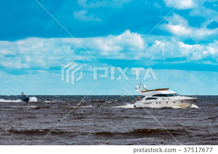 White speed boat in action White speed boat in action 37517677