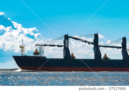 Blue cargo ship underway Blue cargo ship underway 37517680