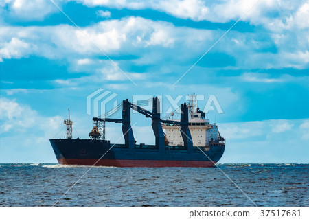Blue cargo ship underway Blue cargo ship underway 37517681