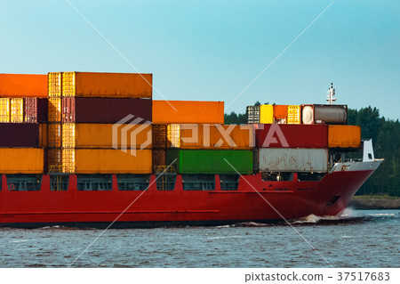 Red container ship underway Red container ship underway 37517683