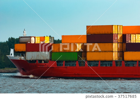Red container ship underway Red container ship underway 37517685