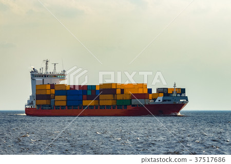 Red container ship underway 37517686