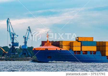 Blue container ship underway Blue container ship underway 37517741