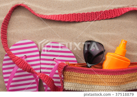 Beach accessories. Bag, sunglasses and flip flops. Beach accessories. Bag, sunglasses and flip flops. 37518879