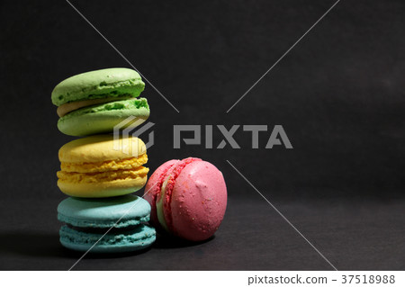 colorful macaroon on black background colorful macaroon on black background 37518988