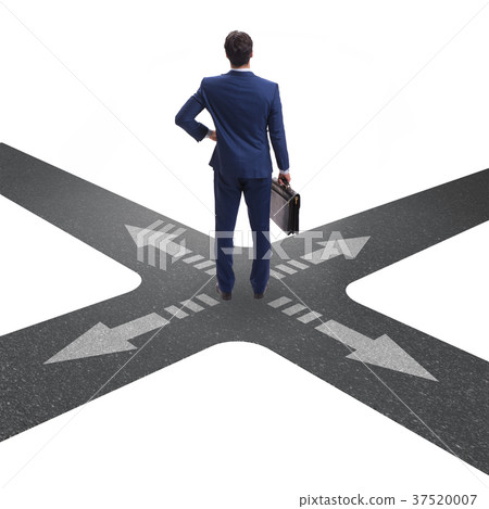 Young businessman at crossroads in uncertainty Young businessman at crossroads in uncertainty 37520007