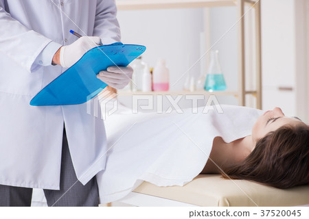 Police coroner examining dead body corpse in 37520045