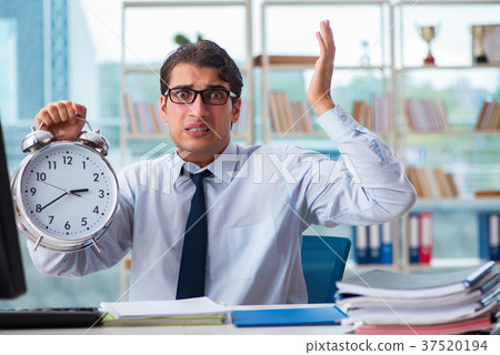 Businessman failing to meet the deadline 37520194